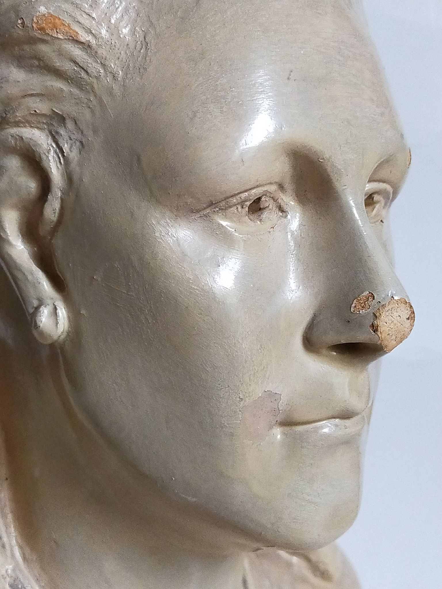 Bust of a woman "the elegant"XIXth in painted plaster signed on its solid wood base