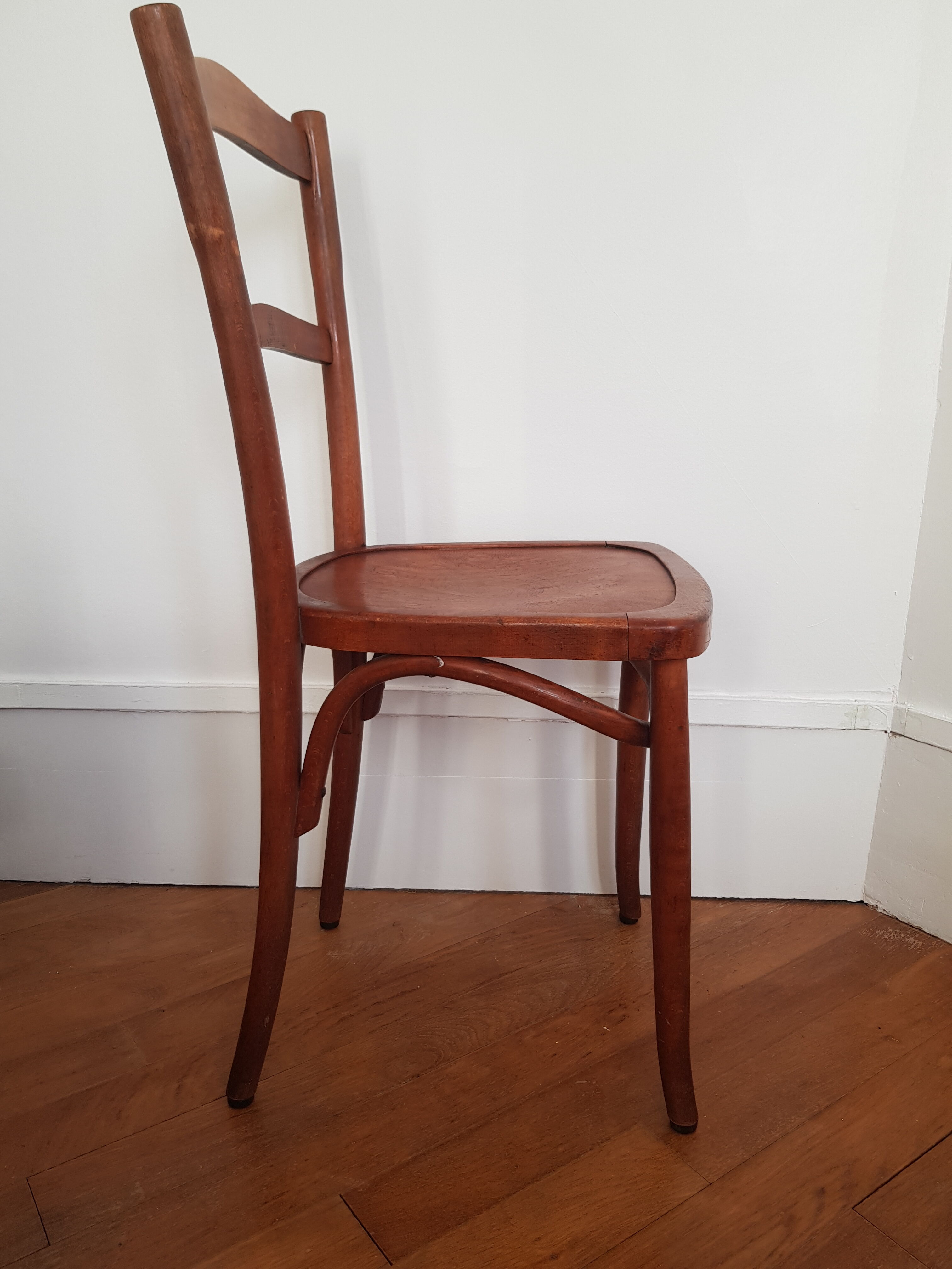 Curved wooden bistro chair