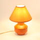 Orange ceramic table lamp with geometric imprints, 1970s.