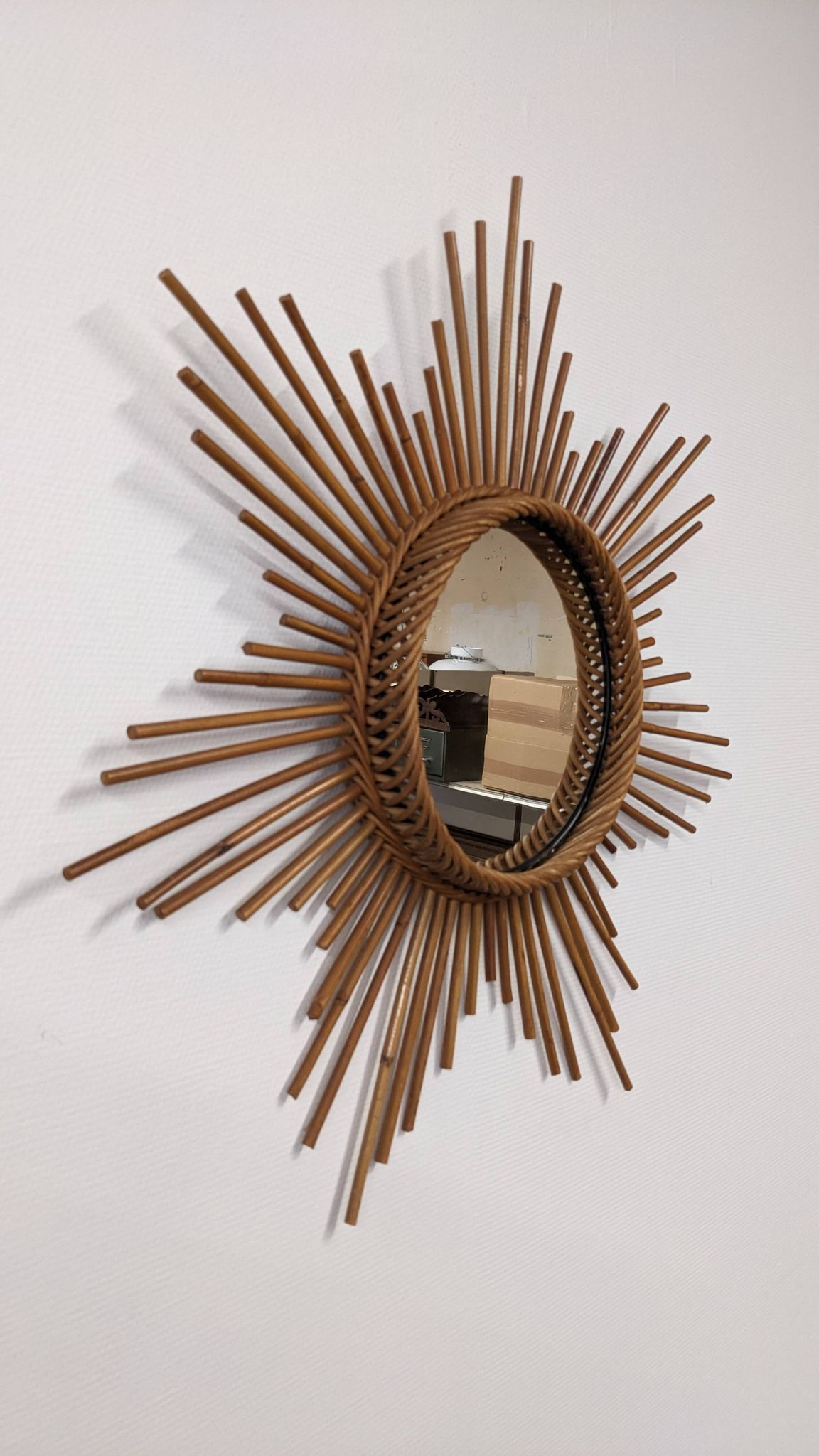 XL starry sun mirror in rattan, France around 1970