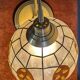 Swan neck lamp. Brass lampshade with mother-of-pearl leaf patterns.