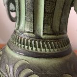 Ancient Greek style ceramic vase with curls