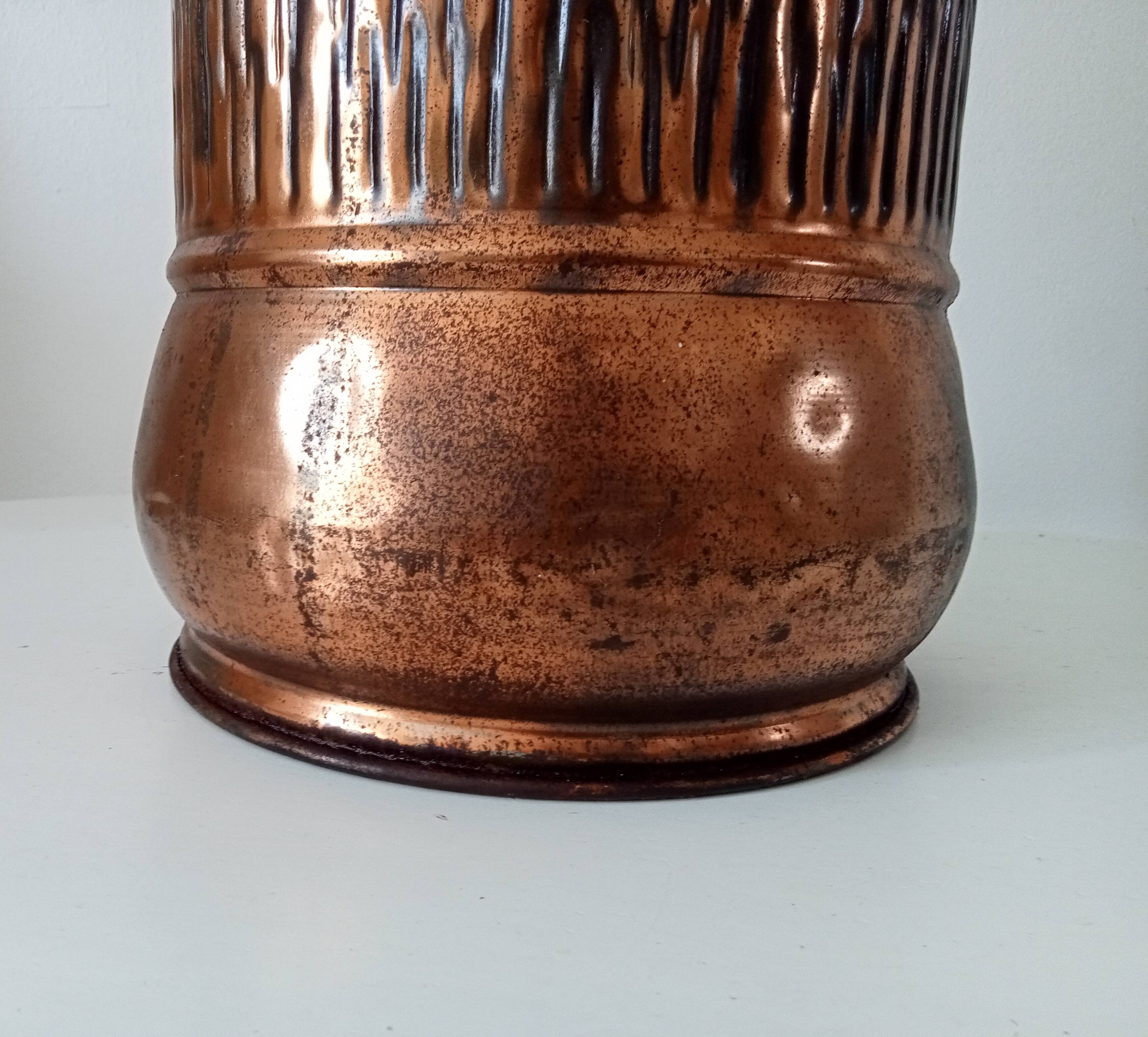 Vintage brutalist umbrella stand in hammered copper with a wood effect.