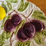Large vintage earthenware dish with a fruit pattern.