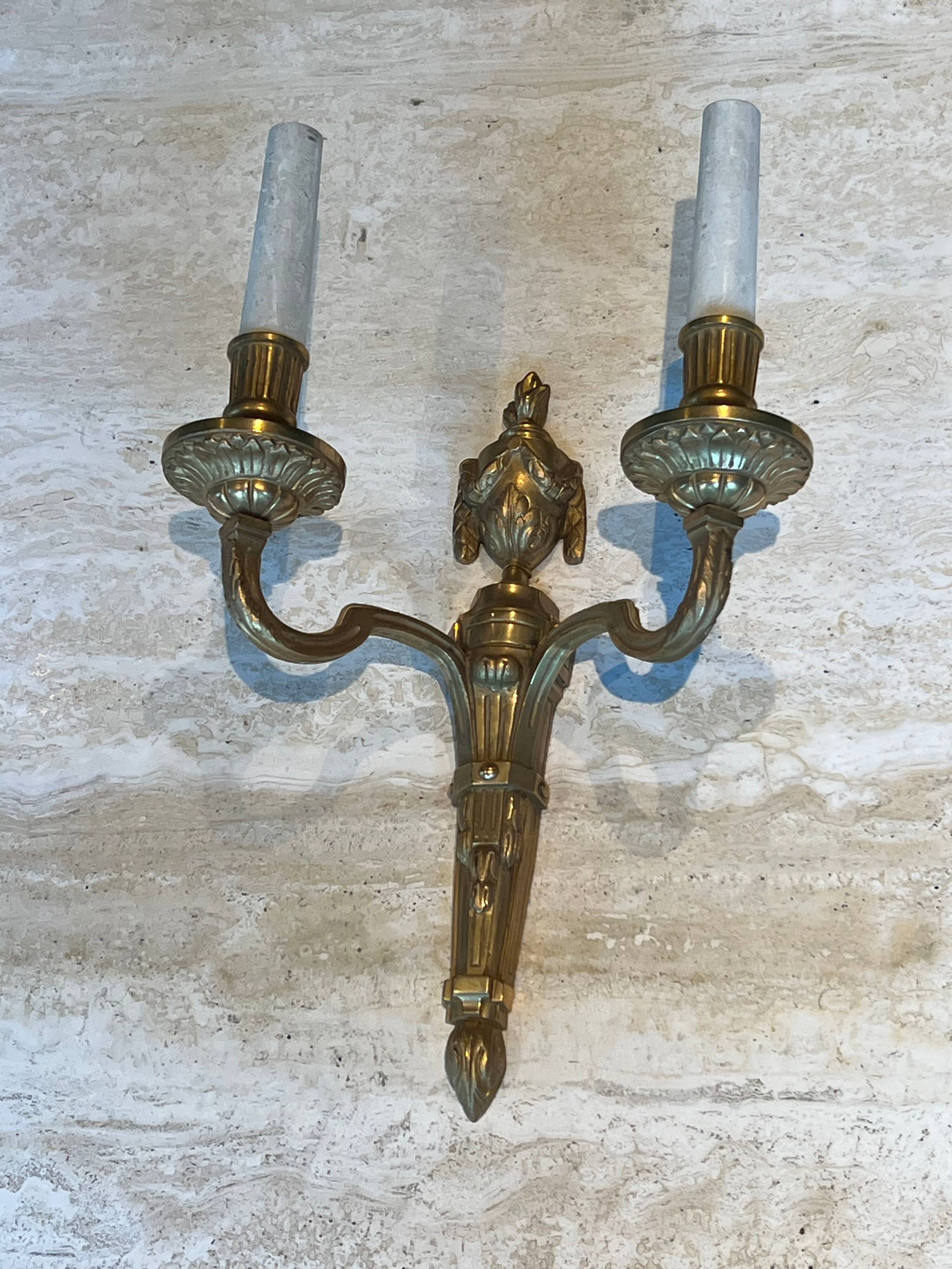 Set of 4 bronze wall lights in Louis XVI style.