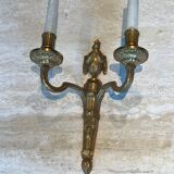 Set of 4 bronze wall lights in Louis XVI style.