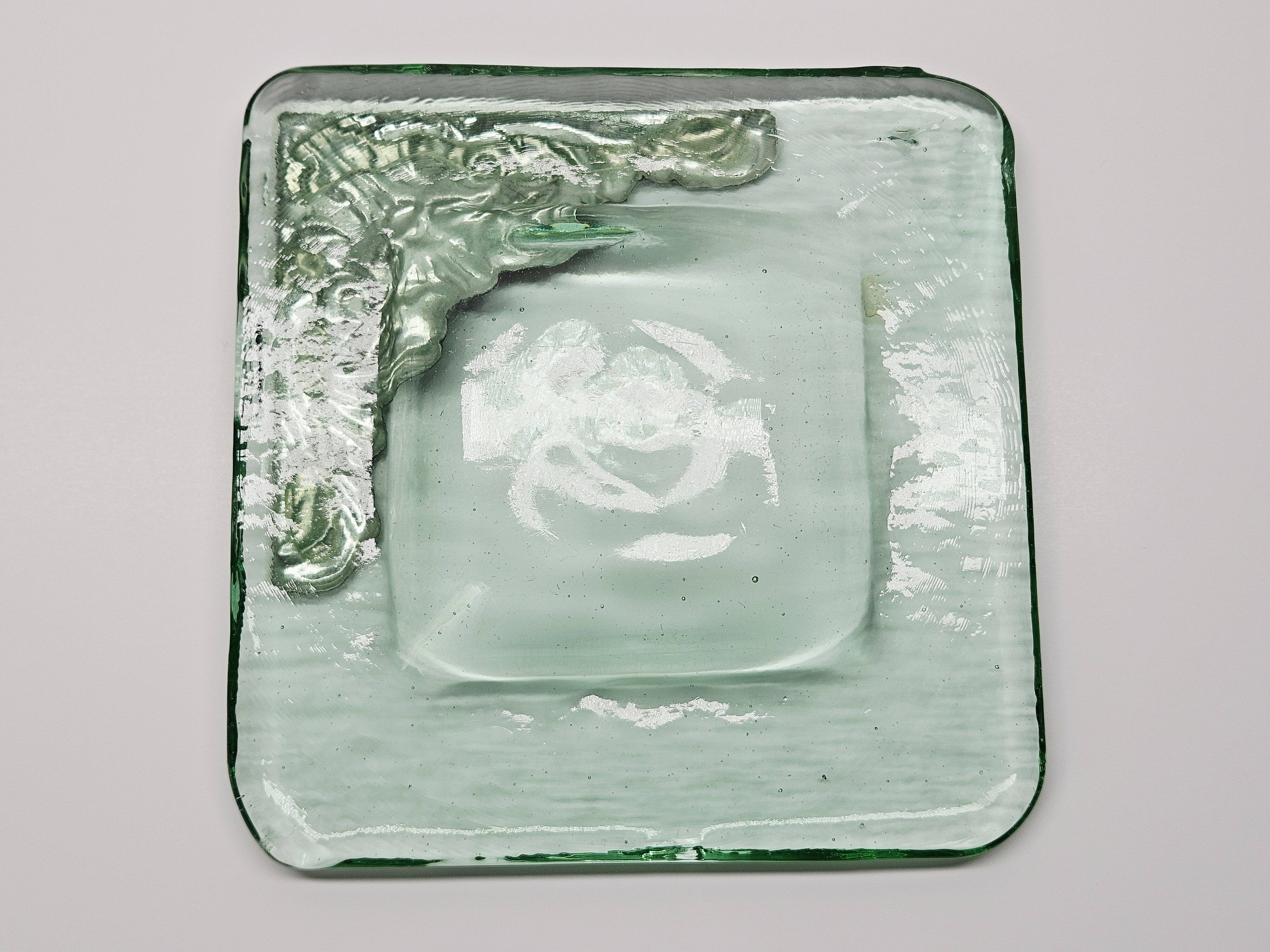 Murano glass catchall, corner adorned with baroque patterns.