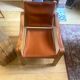 Safari armchair in wood and leather - 1950s style