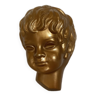 Golden cherub head