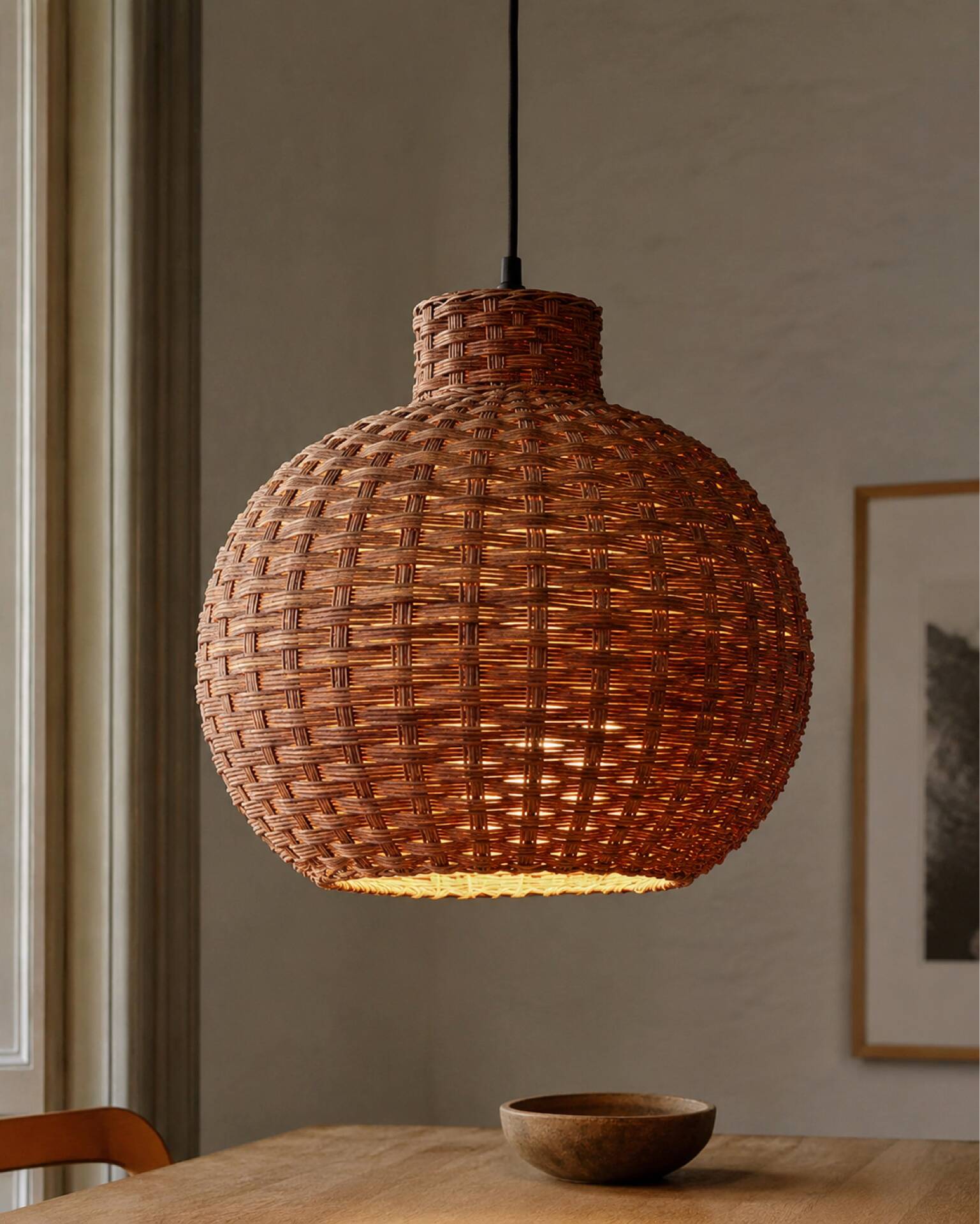 Large vintage lampshade made of hand-woven rattan.