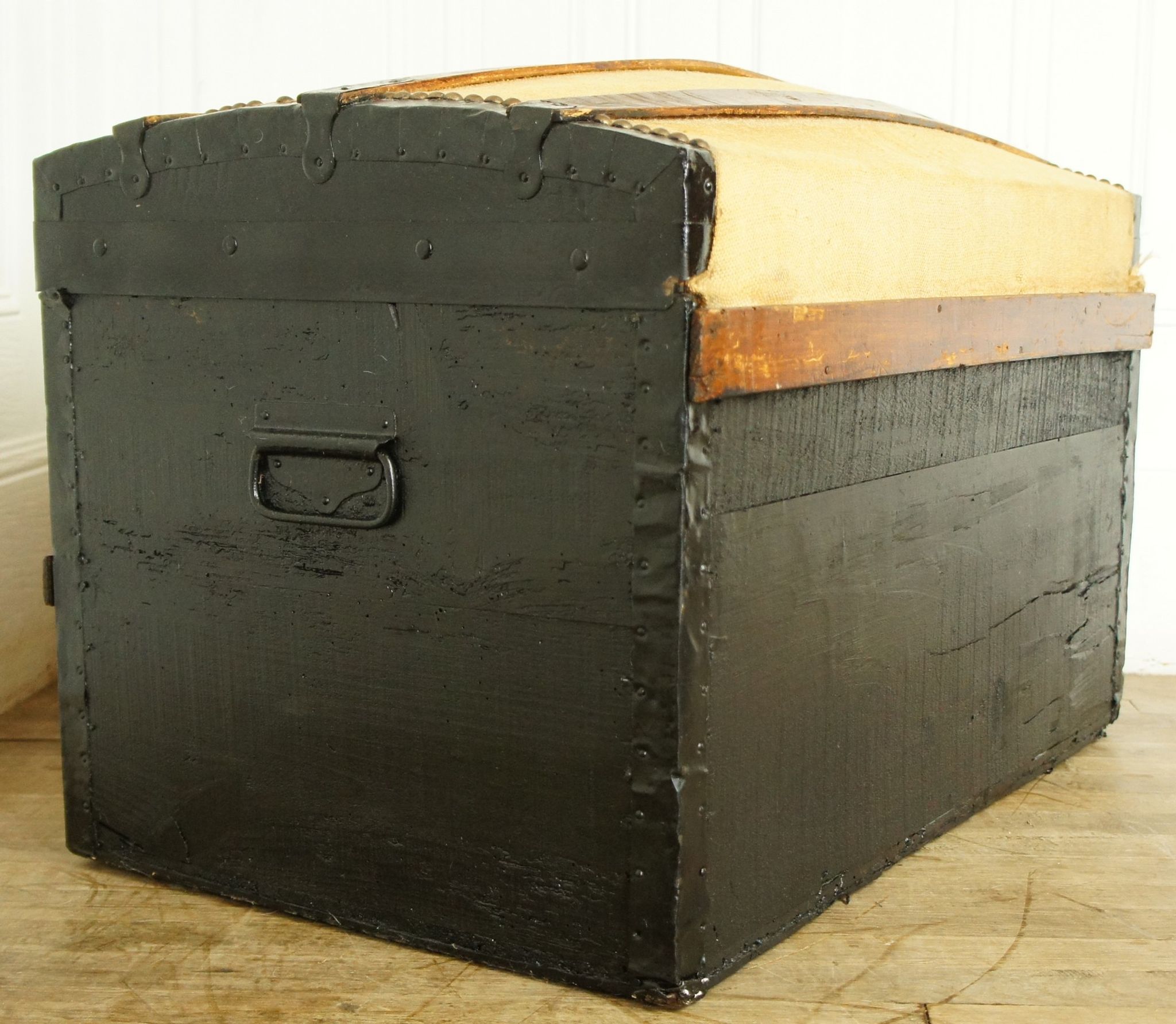 Old-curved wooden trunk - burlap