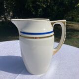 White porcelain decanter with blue and gold edging