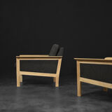 2 vintage oak and felt Danish chaise longues from the mid-century, 1960s.