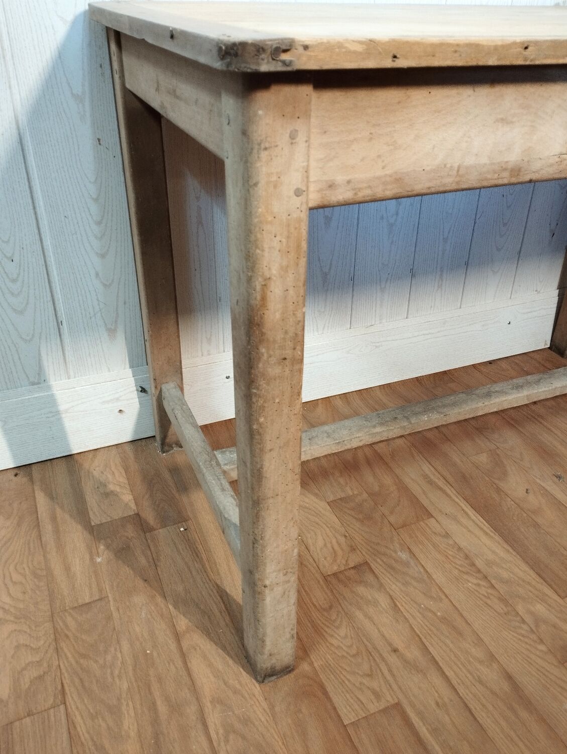 Antique farmhouse table in raw wood