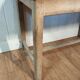Antique farmhouse table in raw wood