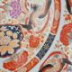 Large deep porcelain plate in Imari style (35.5 cm) with "Phe" decoration.