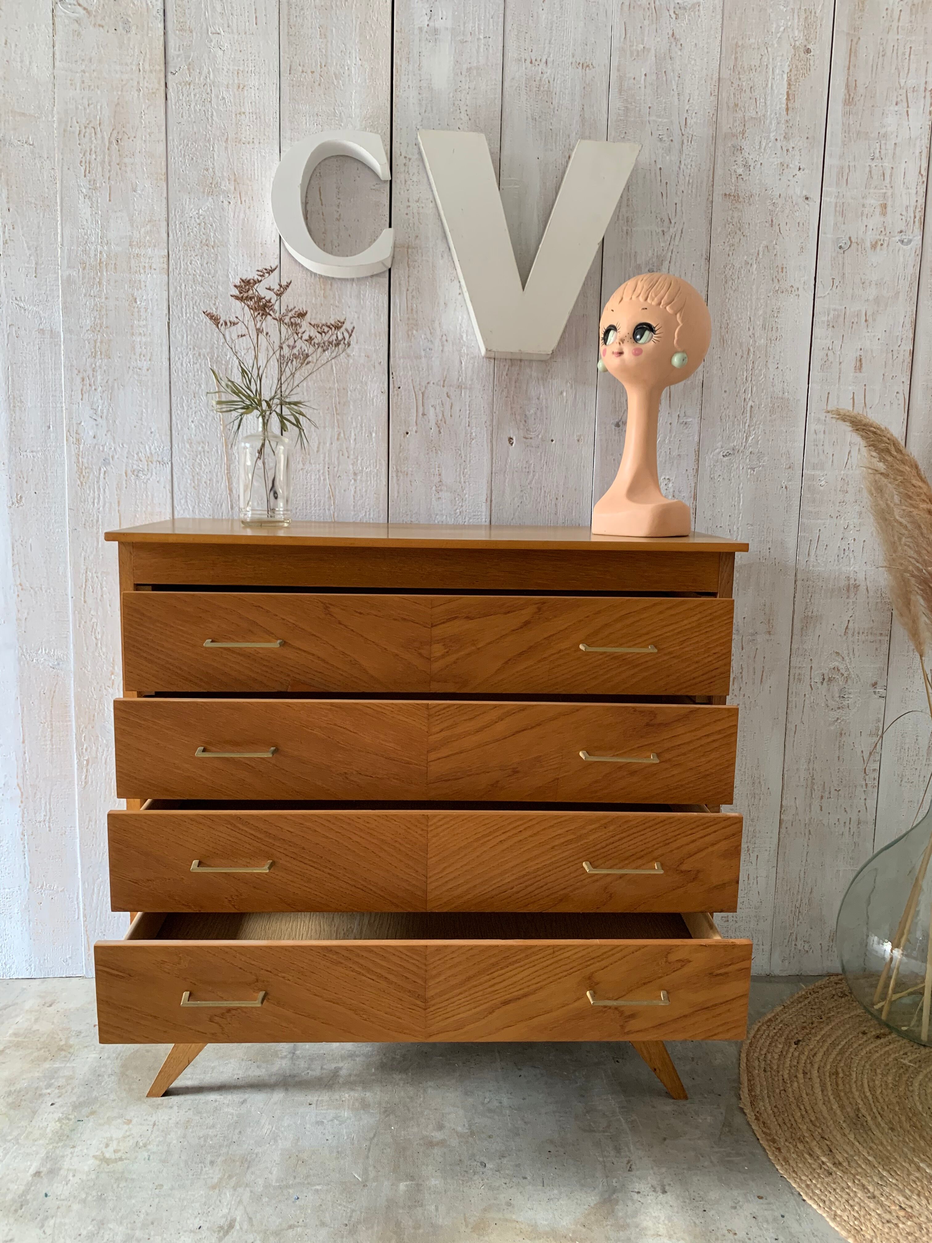 Chest of drawers with compass feet