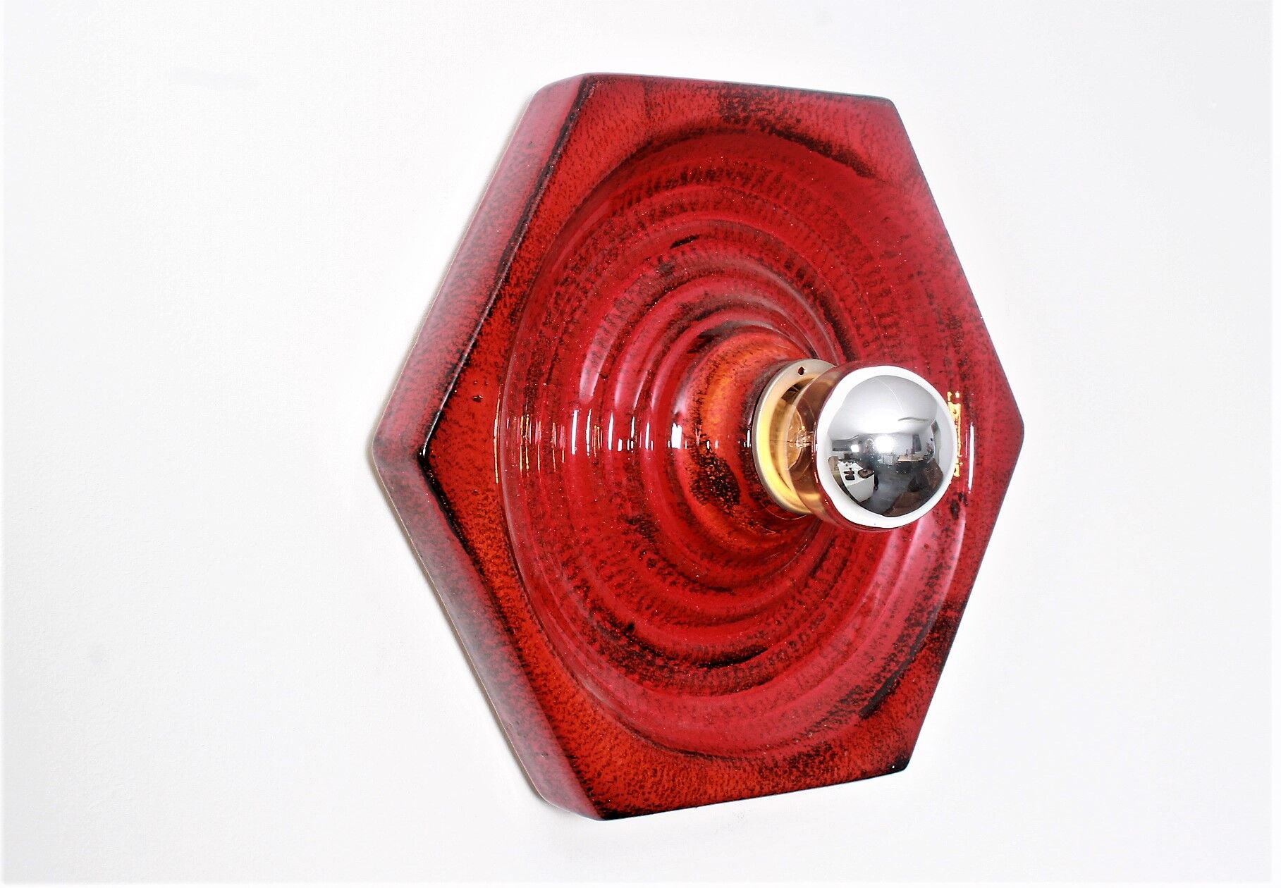 Wall sconce by Hustadt in shiny red