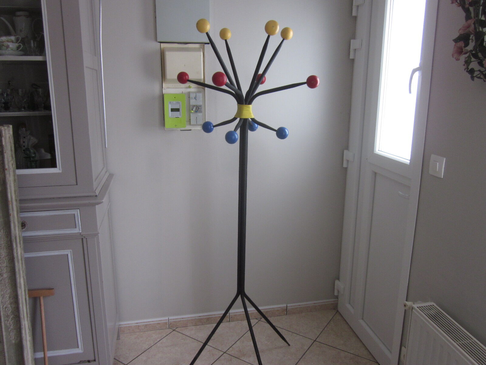 Vintage coat holder has 12 balls