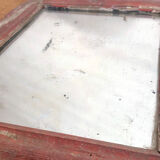Old mirror in red wood