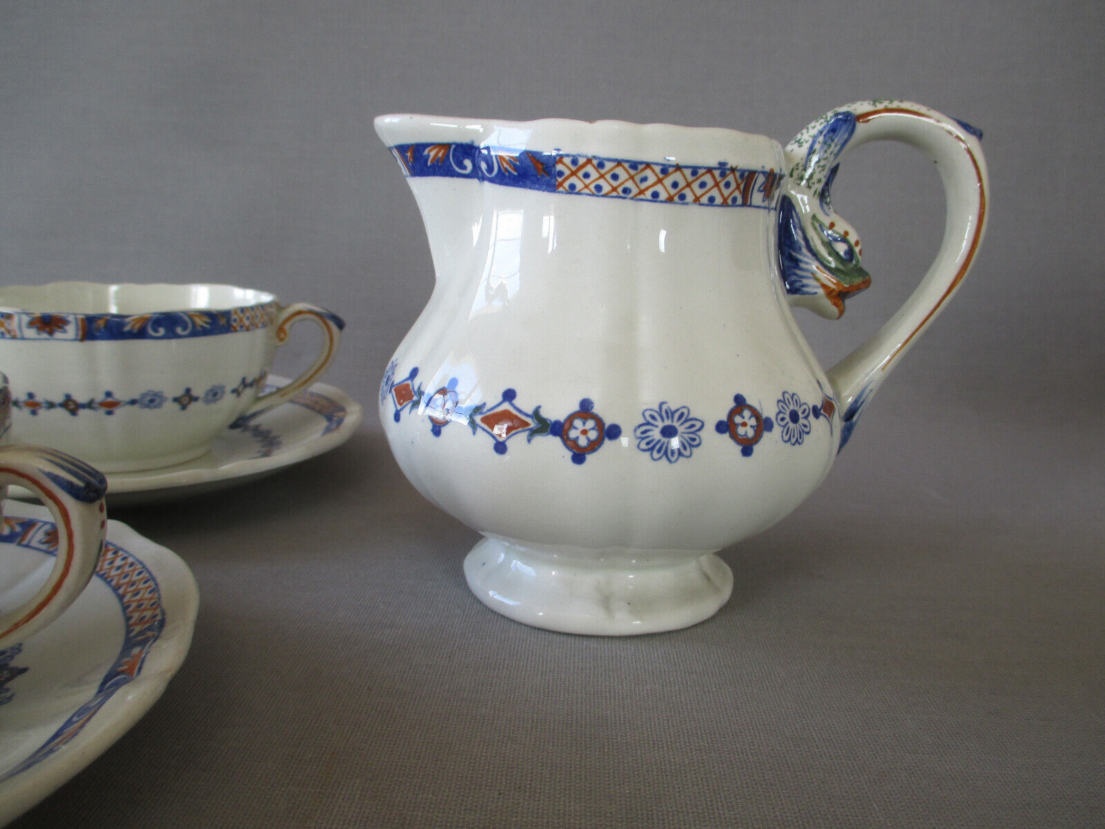 4 cups and saucers & creamer Rouen E. Bourgeois