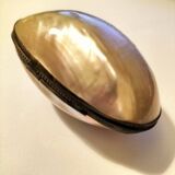 Old mother-of-pearl rosary in its egg box