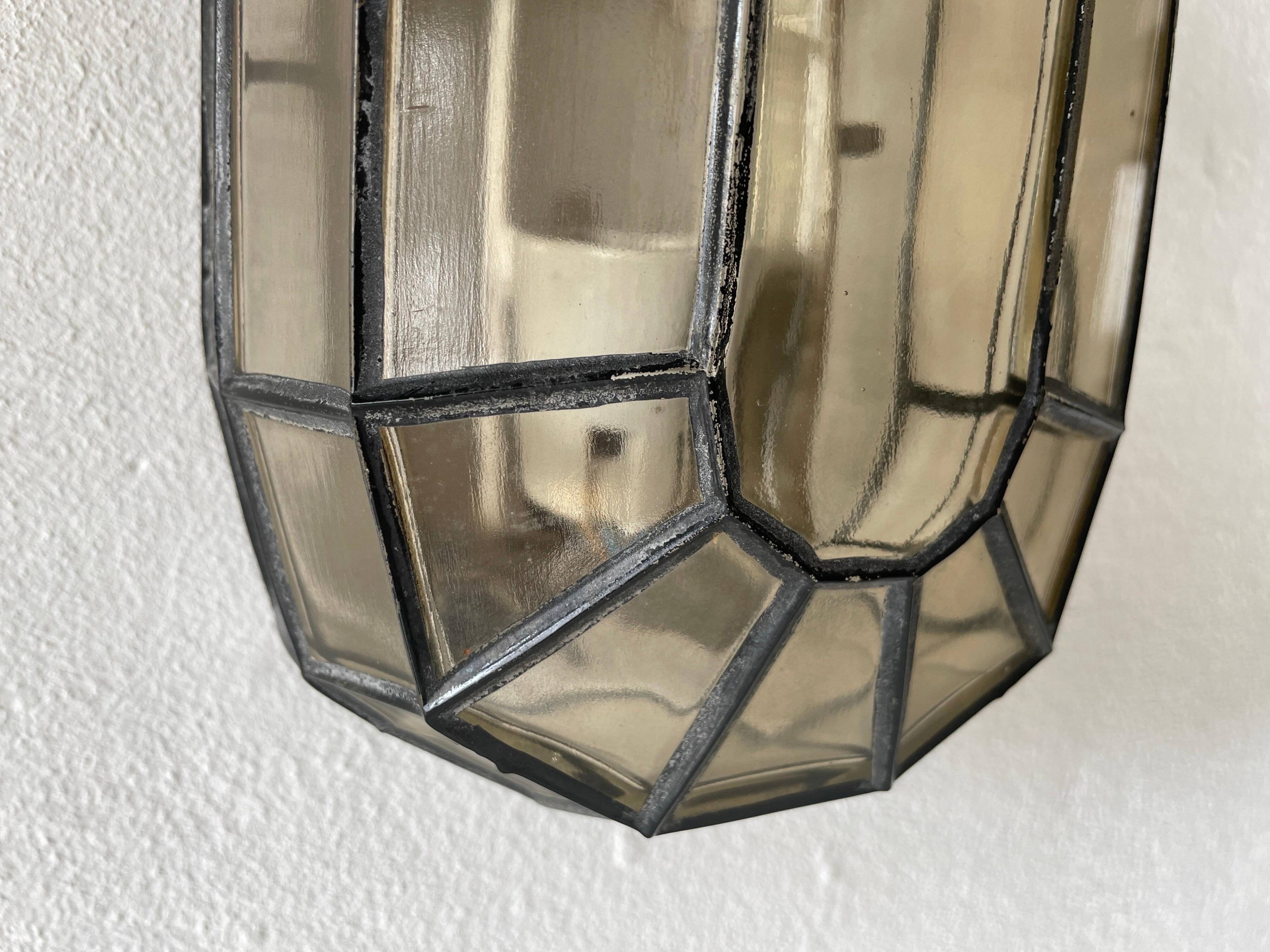 Pair of black iron wall sconces with structured glass by Limburg, 1960s, Germany.