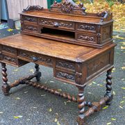 19th-century Renaissance carved oak desk with chair