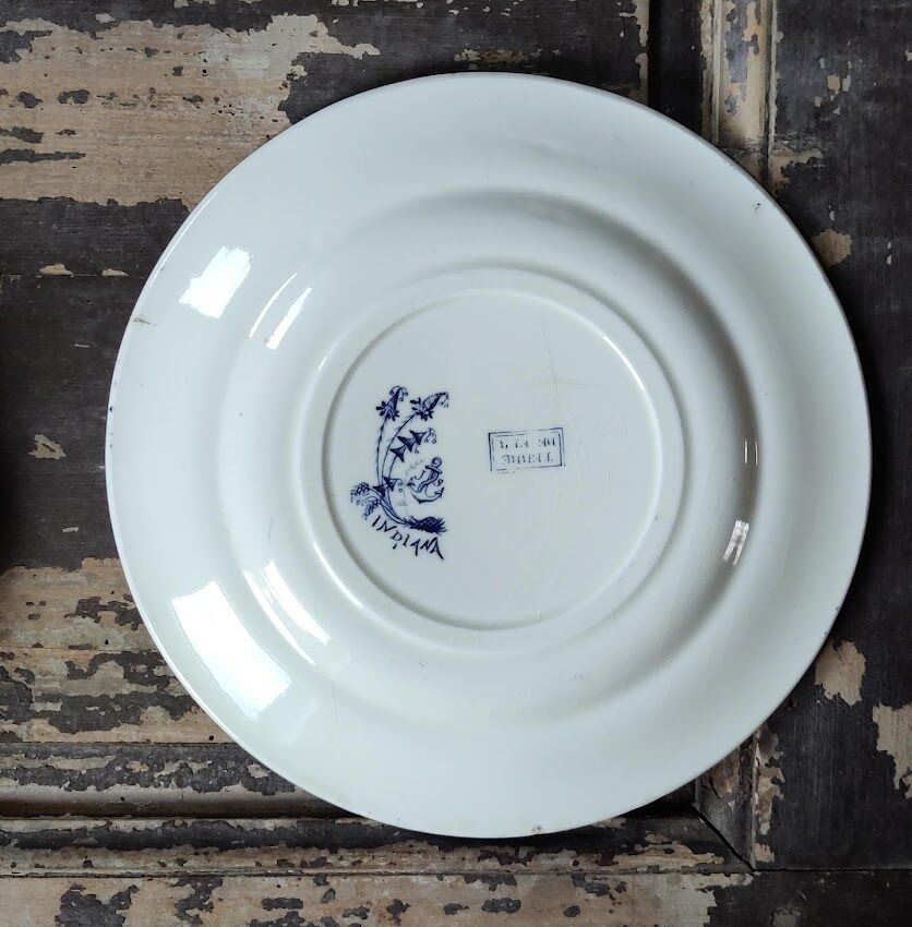 Set of four flat plates in iron earth