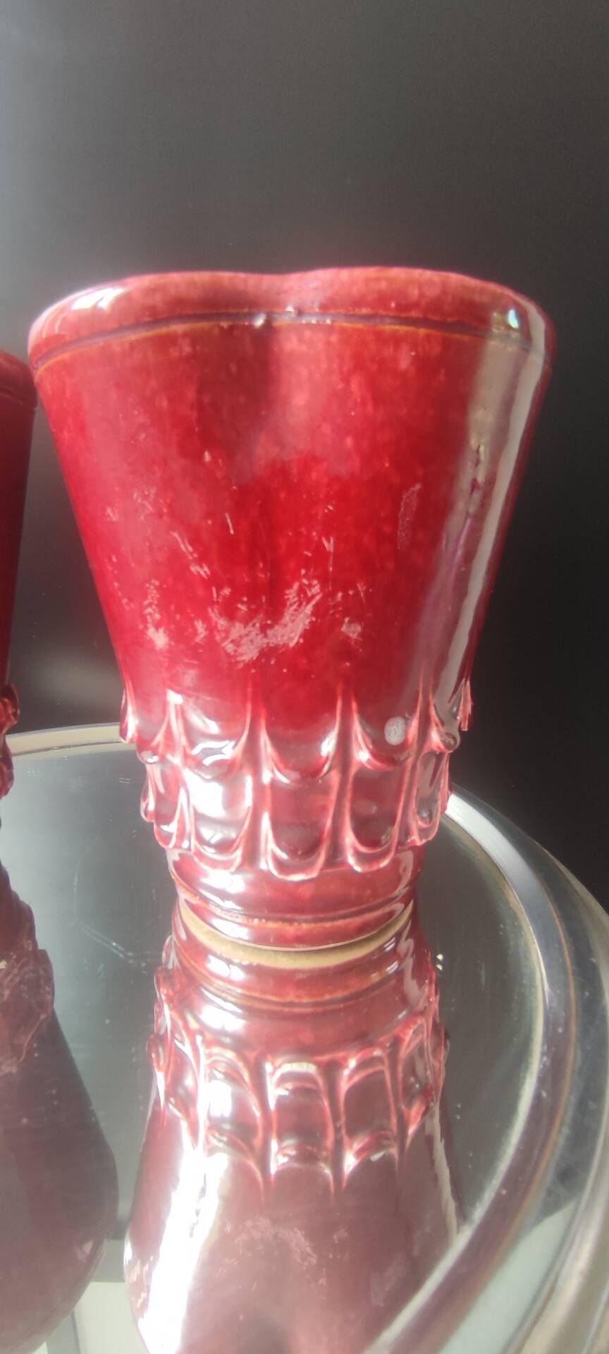 Pair of Art Deco asymmetrical red oxblood ceramic vases