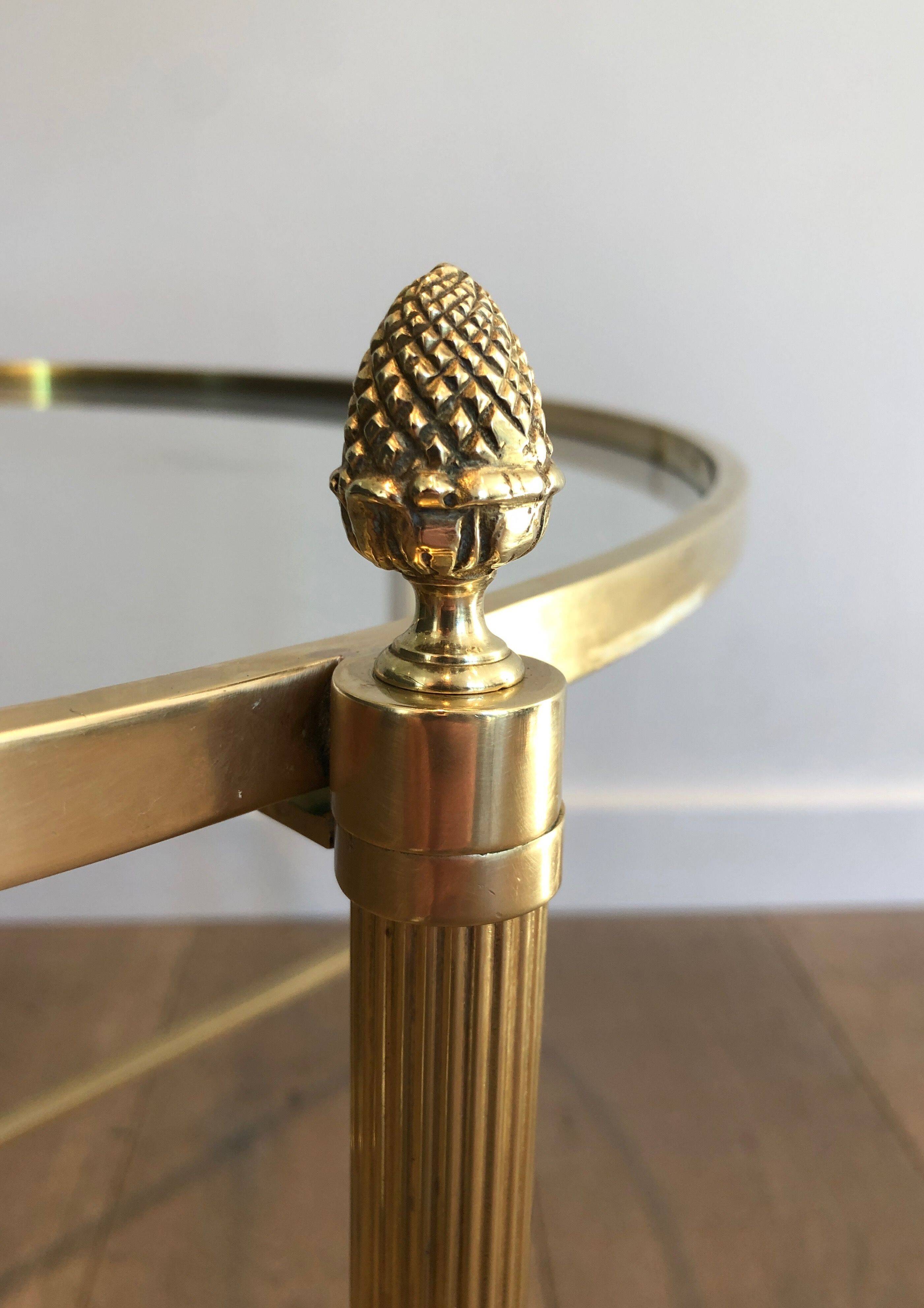 Round brass coffee table. Maison Baguès