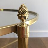 Round brass coffee table. Maison Baguès