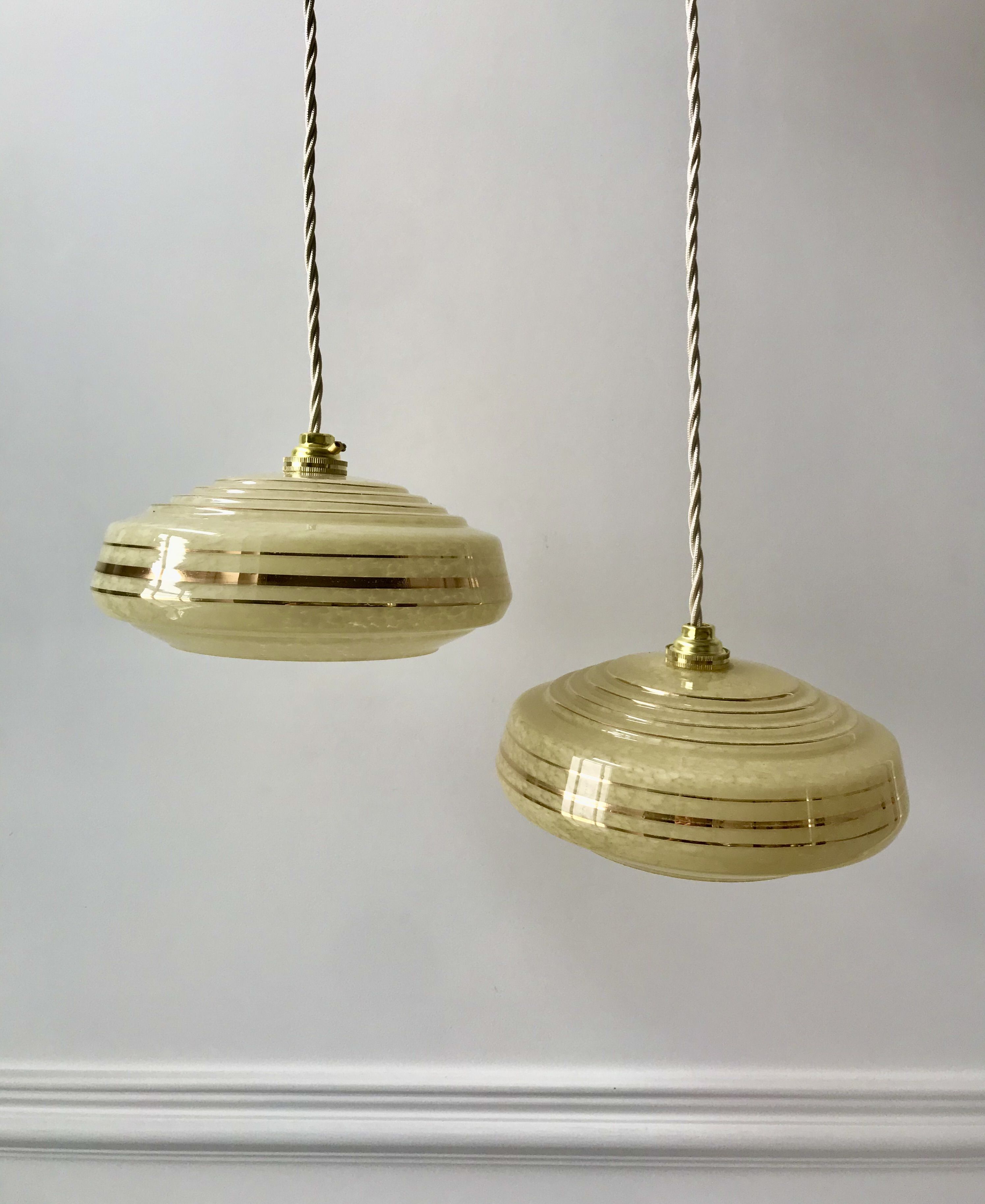 Pair of suspensions in yellow Clichy glass and golden border 40s-50s