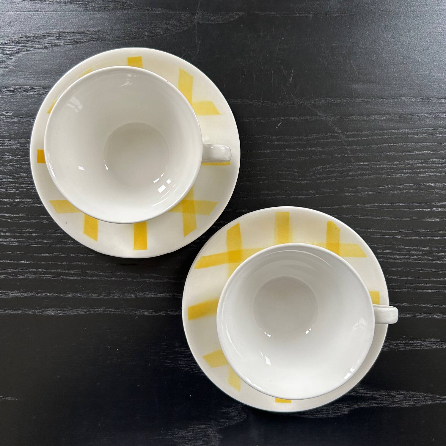 Pair of yellow checkered mugs