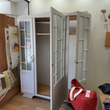 Glass-fronted Parisian wardrobe