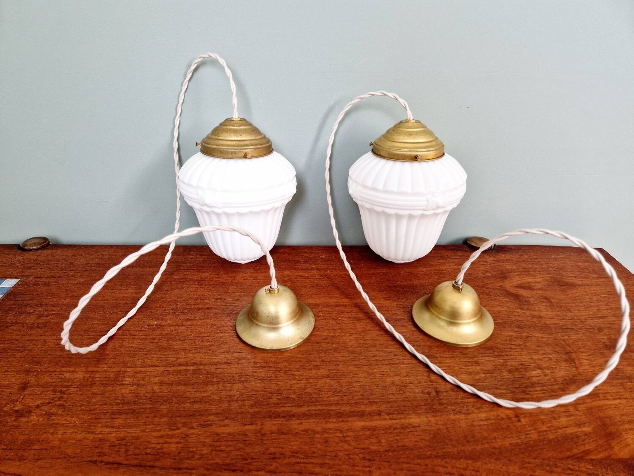 Pair of Art Deco pendant lights in pressed white opaline glass, 1920-30