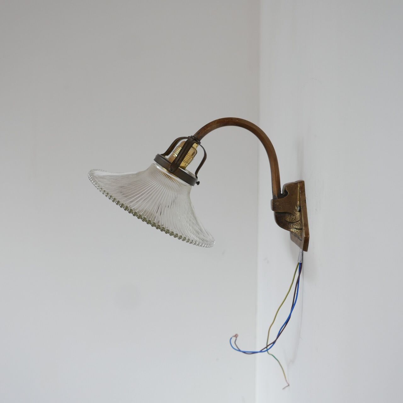 Pair of brass and glass wall sconces