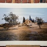 Laminated photograph.