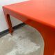 Square orange fiberglass coffee table