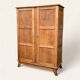 Solid oak compass foot cabinet René Gabriel 1945