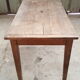 Old table feet spindles one drawer piling