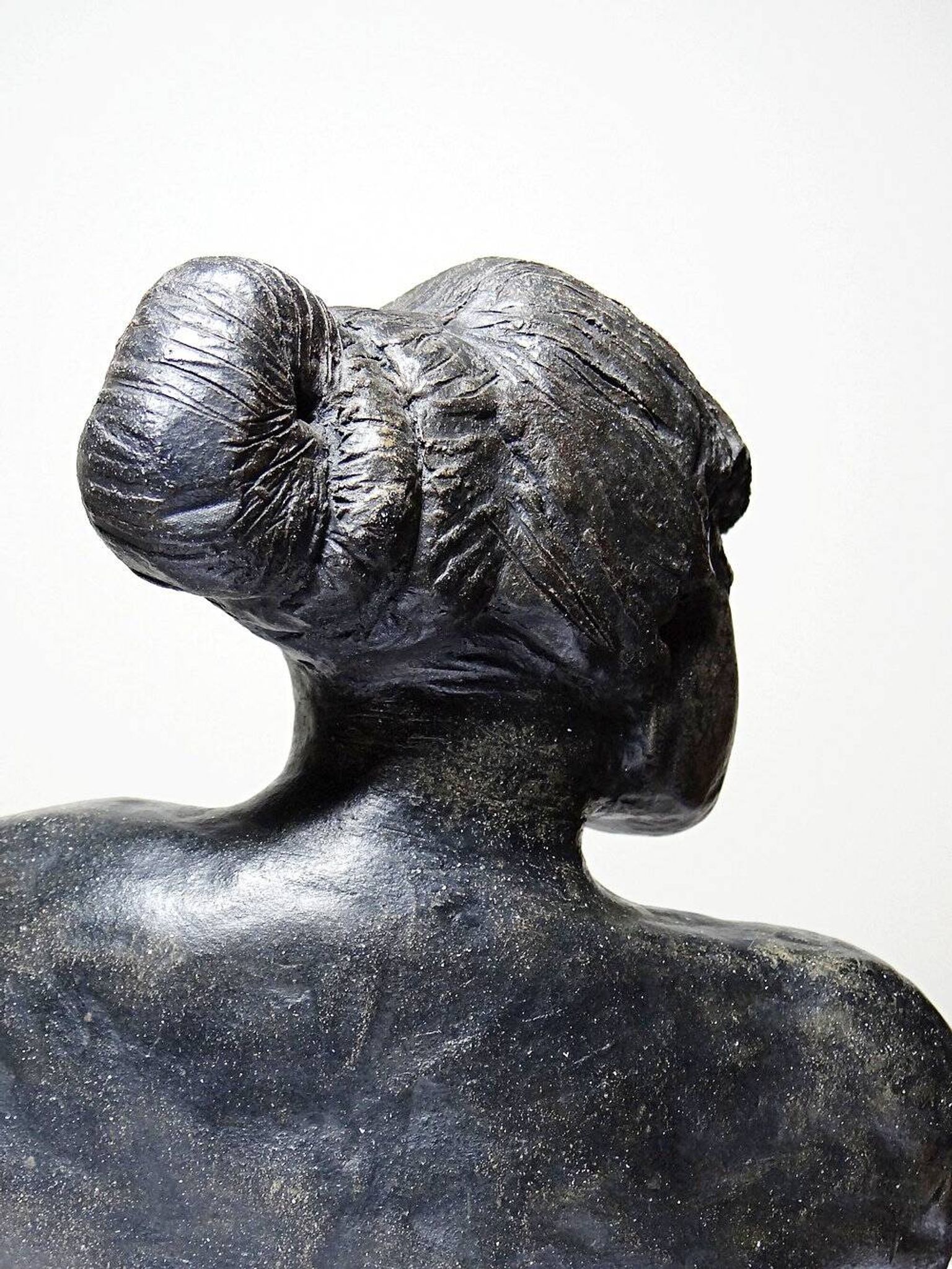 20th-century ceramic bust of a woman, an unidentified piece of art.