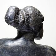 20th-century ceramic bust of a woman, an unidentified piece of art.