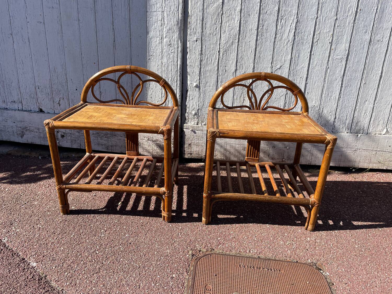 Pair of rattan/wicker bedside tables