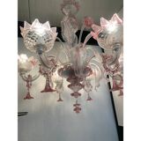 Chandelier in transparent and pink Murano-style glass with flower and leaf.