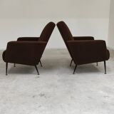 Pair of dark brown rockabilly style armchairs in new vintage condition