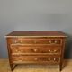 Louis XVI commode in walnut, beech, and brass.