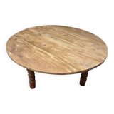 Oval coffee table in raw wood
