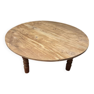Oval coffee table in raw wood