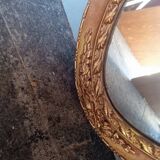 Oval mirror 134cm wood and gilded stucco early 20th century